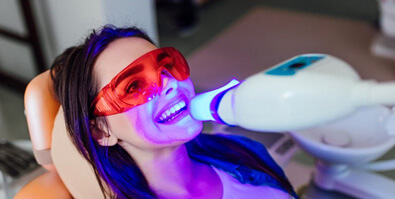 lady receives teeth whitening